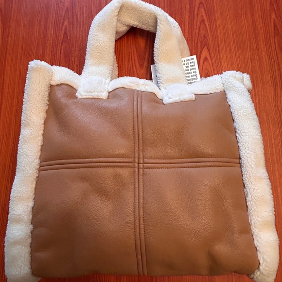 Stand Studio Medium Lolita
Faux Shearling & Faux Leather Tote - Picture 5 of 14